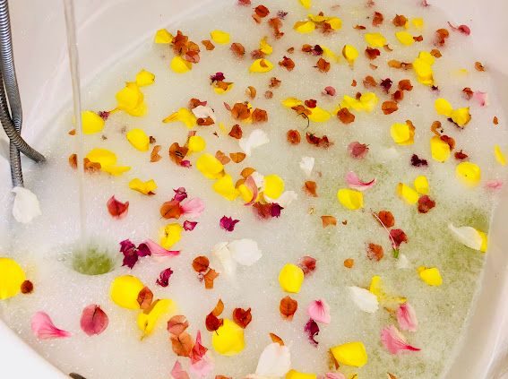 Superior Room bath setup with flower petals